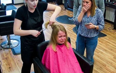 The Word Hidden Beneath Her Hair